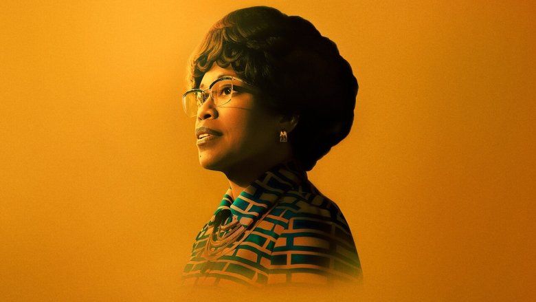 Regina King as Shirley Chisholm in a tense meeting, her expression a mix of determination and exhaustion