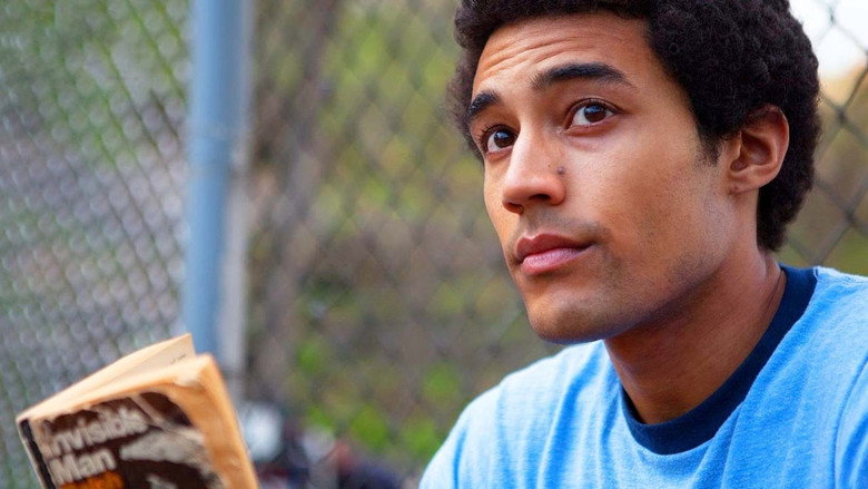 A young Barack Obama, played by Devon Terrell, sits alone in a dimly lit New York City apartment, his expression unreadable.