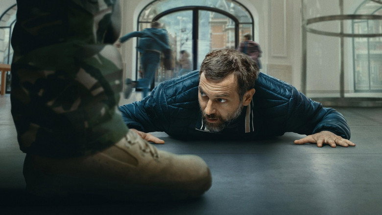 A tense standoff inside the Apple Store, with hostages huddled under tables and the gunman looming over them.