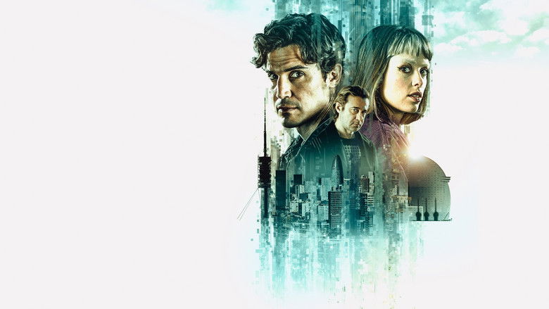 A dimly lit, sparse apartment interior where a lone character sits at a desk bathed in the blue glow of monitors.