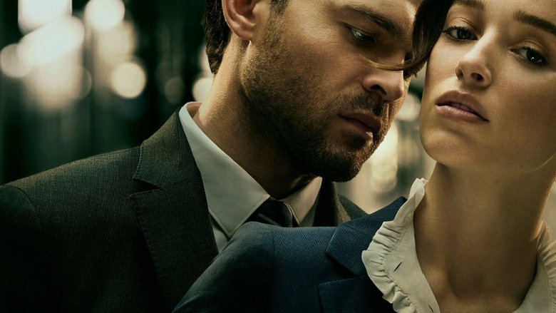 Emily and Luke in their apartment, the city lights pressing against the windows like a second set of walls
