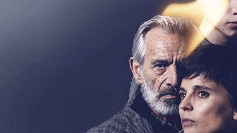 Sara staring out of a rain-streaked window