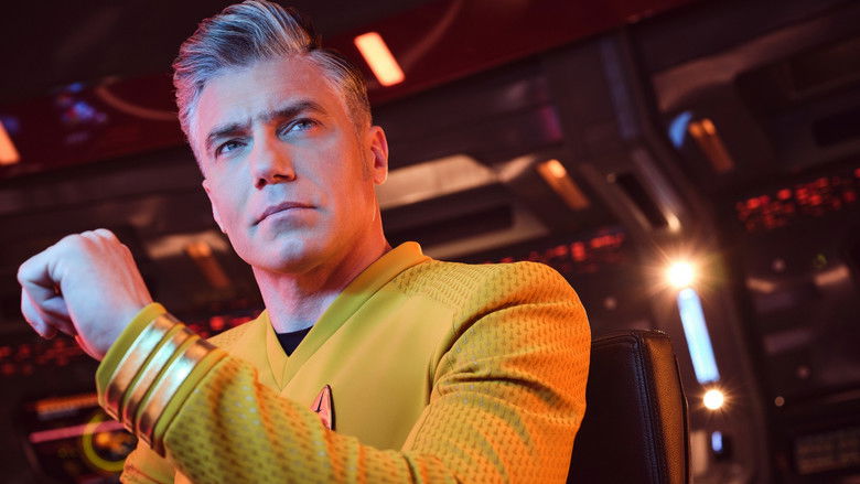 Captain Pike standing resolutely on an alien world