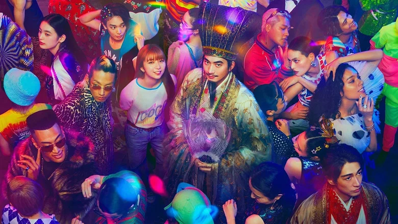 Kongming and Eiko standing under Shibuya’s neon lights, his ancient robes contrasting with her modern streetwear