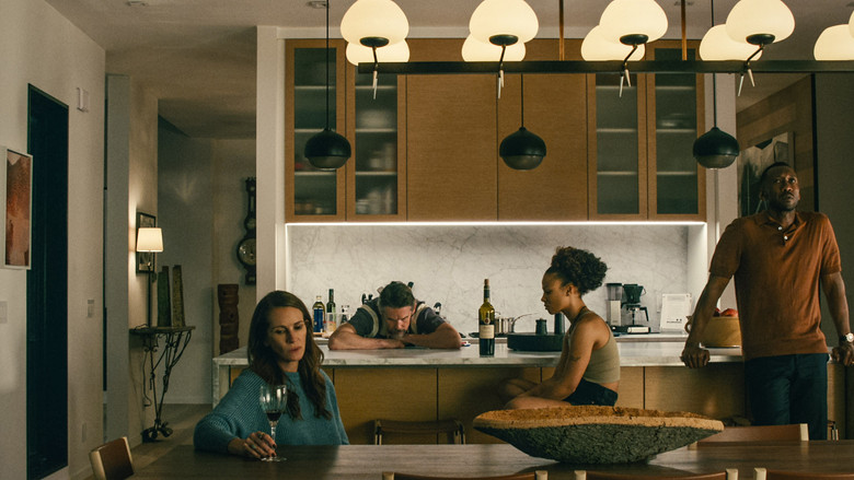 A wide shot of the luxurious, isolated rental home at dusk