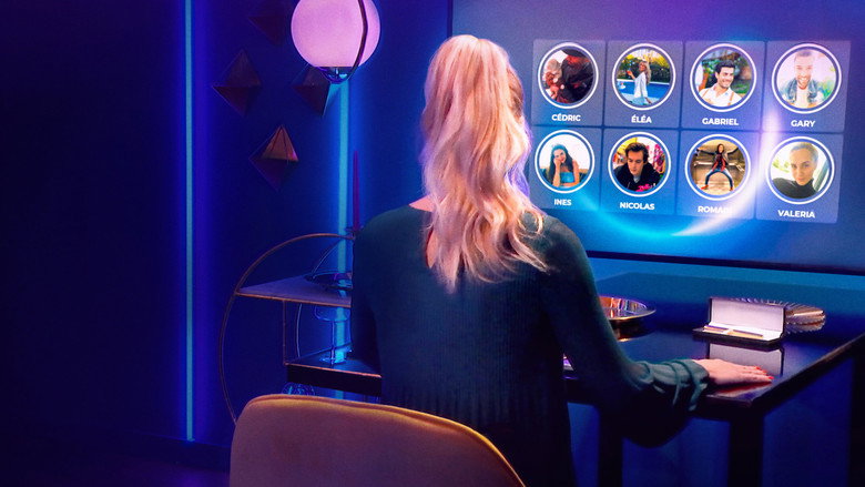 Contestants in separate apartments, their faces reflected in glowing screens