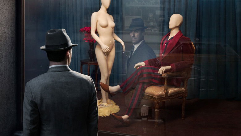 Don Draper sitting alone in a mid-century office