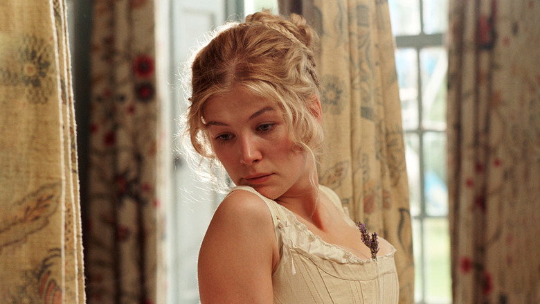 Mr. Darcy and Elizabeth in a tense exchange at a ball