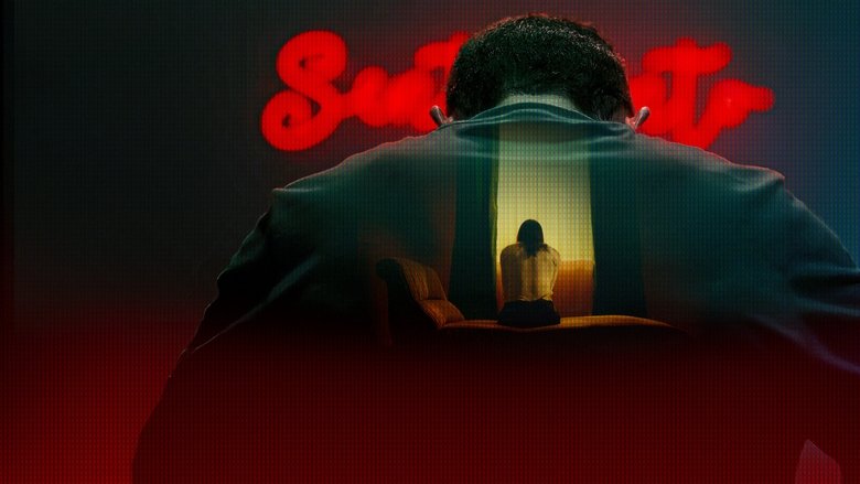 A sleek modern apartment overlooking the city at night