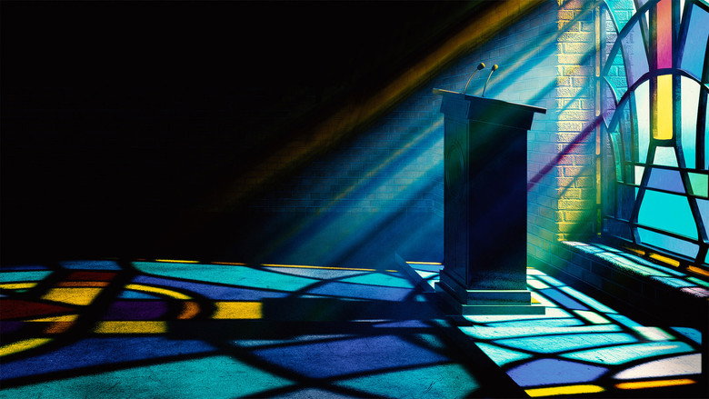 A congregation bathed in golden light, hands raised in worship