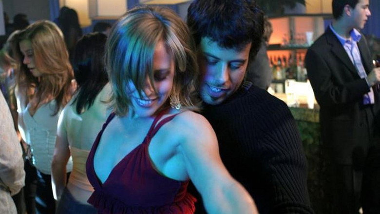 A tense, intimate moment between the characters, highlighting the subtle anxieties of impending fatherhood