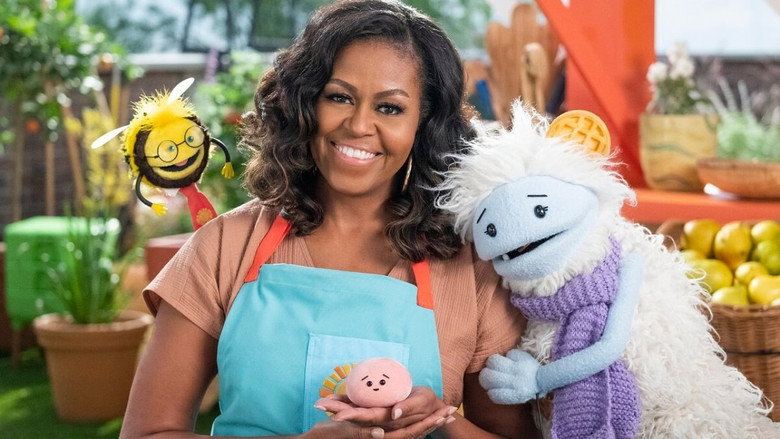 Two puppet characters, one shaped like a waffle and the other like a ball of mochi, stand in a colorful supermarket aisle, wide-eyed and curious