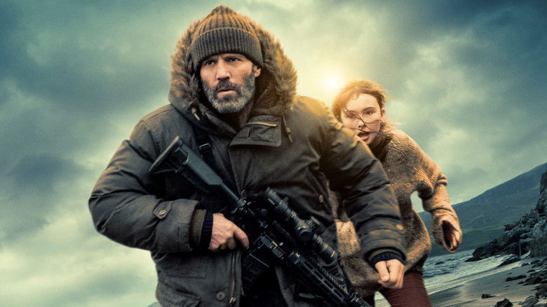 Michael Mason standing alone near the broken lighthouse