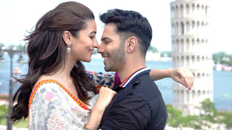 A tense confrontation between Varun Dhawan and Alia Bhatt, their expressions a mix of frustration and unresolved emotion