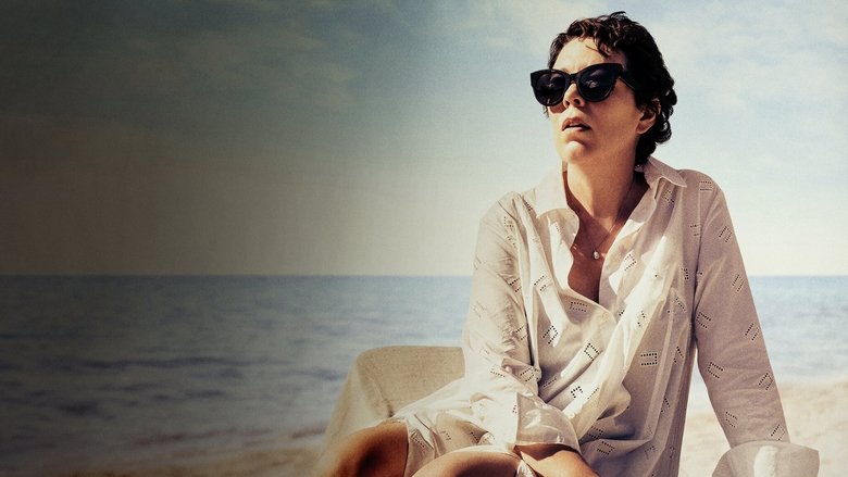 A woman in a wide-brimmed hat stands on a sunlit beach, her shadow stretching long behind her, as if she's being pulled in two directions.