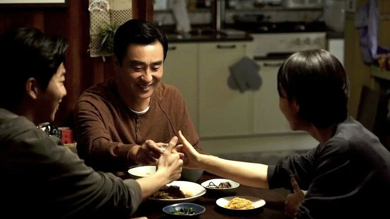 Mr. Kim walking away from the company building