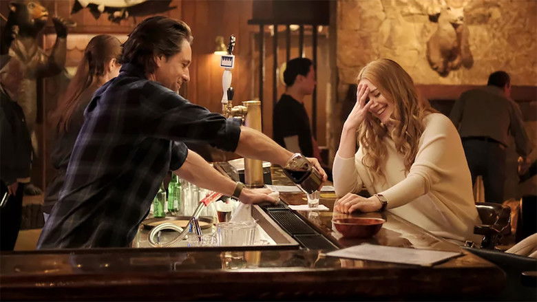 Mel Monroe stands inside the rustic clinic, looking pensive as she consults a patient chart.