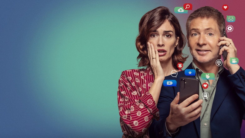 Carlos, mid-meltdown, clutching his phone like a life preserver while his wife looks on in exasperation