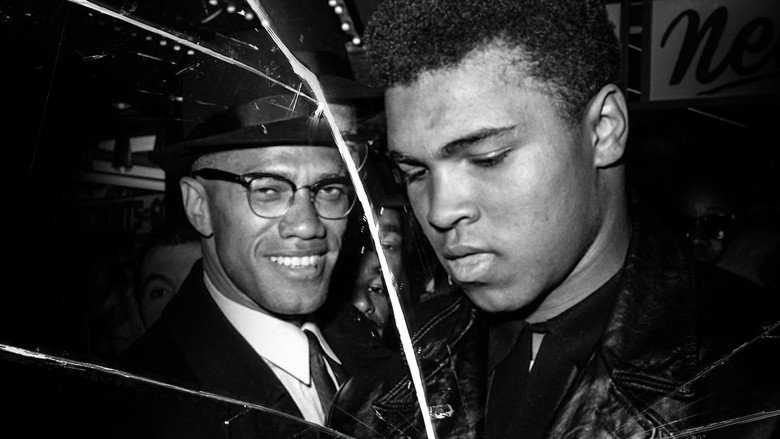 Malcolm X and Muhammad Ali in a candid moment, their expressions revealing the unspoken tension between them