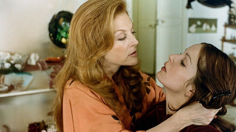 Hélène looking pensive in a dimly lit room