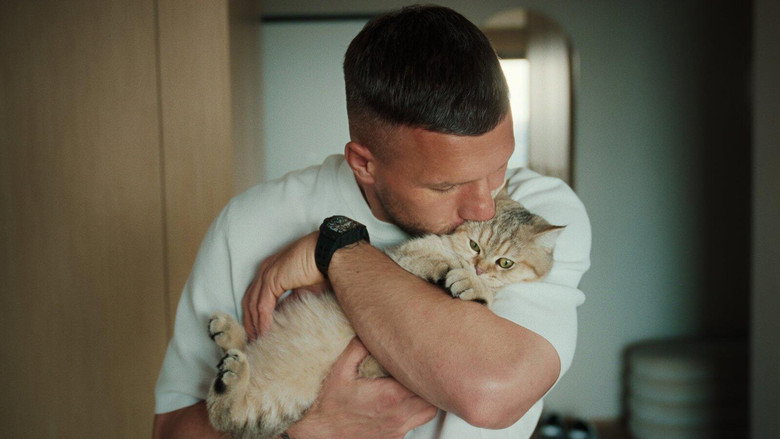 A quiet moment in a Cologne kebab shop, Podolski’s reflection visible in the glass counter.
