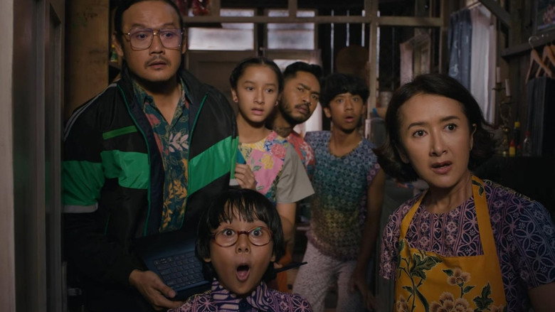 The Sukaharta family huddled around a tiny table, counting coins under a single bare bulb
