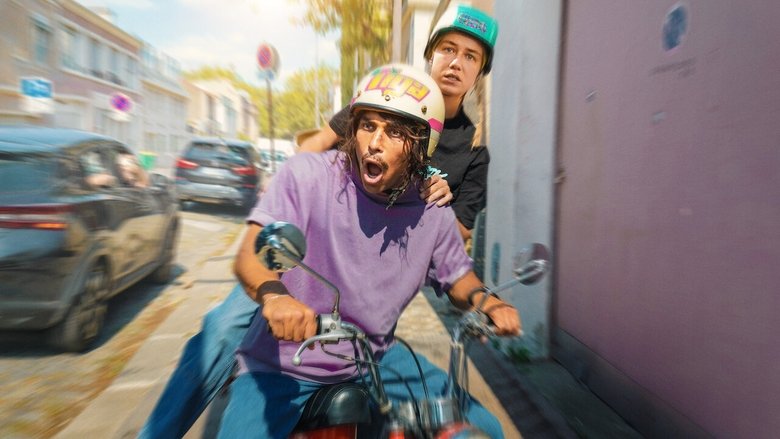 A tense standoff in a neon-lit alley, Youssef and Stéphanie circling each other with equal parts suspicion and attraction.