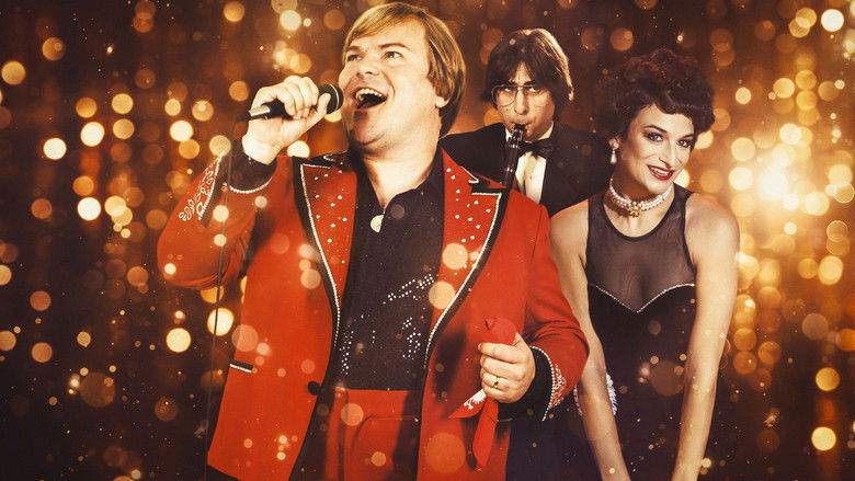 Jack Black as Jan Lewan, mid-performance in a rhinestone-studded jacket, his face alight with the kind of joy that makes you question his grip on reality.