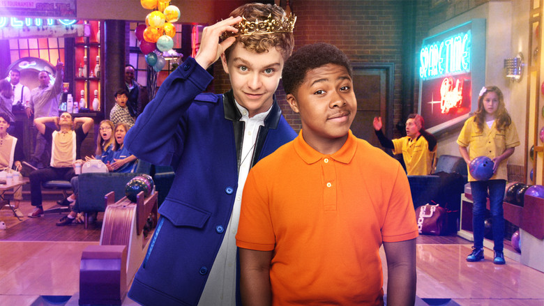 A prince and his new friend stand in a bowling alley, surrounded by neon lights and the faint glow of teenage awkwardness.