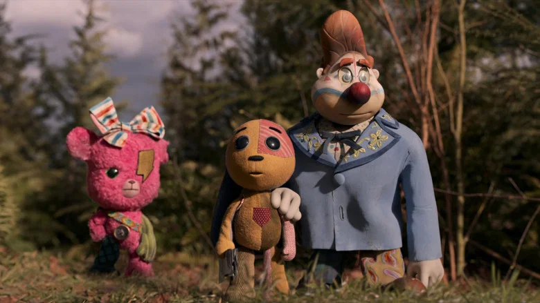 Billy, a young boy with wide, curious eyes, reaches out toward Ollie in a sunlit field, the rabbit’s animated form glowing against the live-action backdrop.