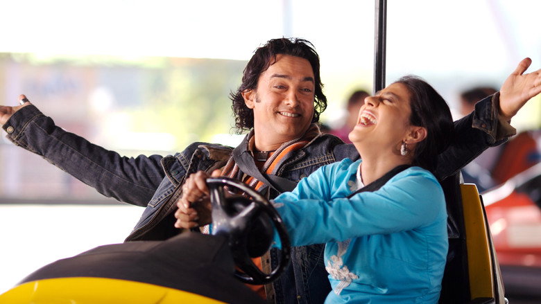 A close-up of Kajol’s face, her eyes wide with shock, as if she’s just seen something she can’t unsee
