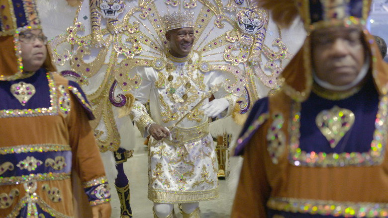 A Zulu king in full regalia, his face painted in black, surrounded by club members in elaborate costumes, their expressions a mix of pride and exhaustion.