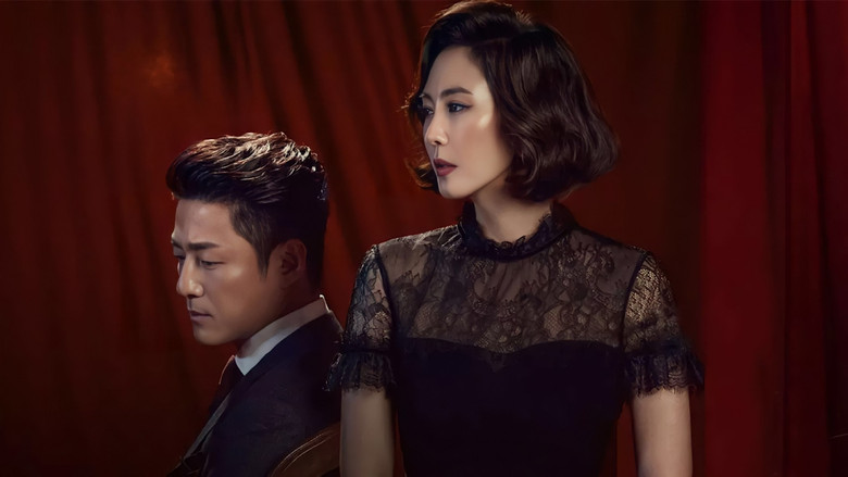 A close-up of Go Hye-ran, her face half in shadow, as she listens to a question she doesn’t want to answer