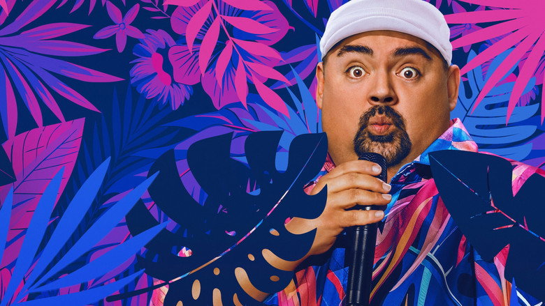Iglesias on stage, mid-gesture, his face lit with the kind of exaggerated expression that’s become his trademark