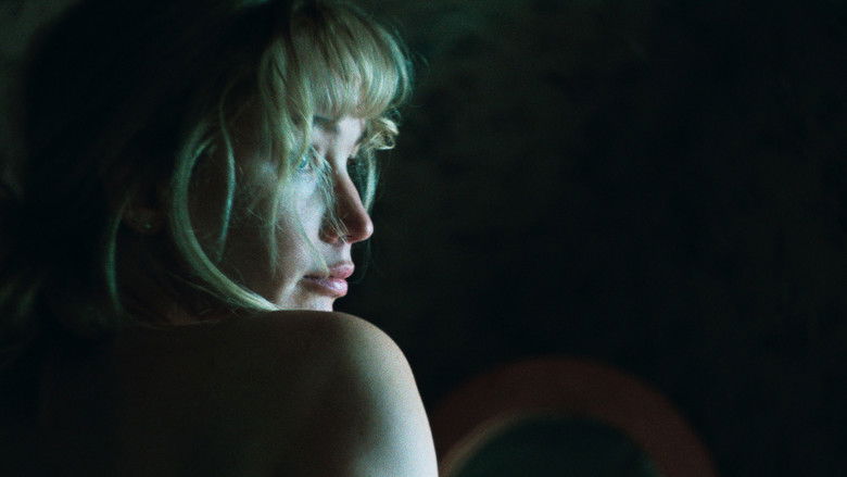 Grace staring out the window into the dark