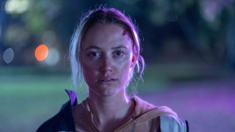 Ava running through the neon-lit rodeo grounds