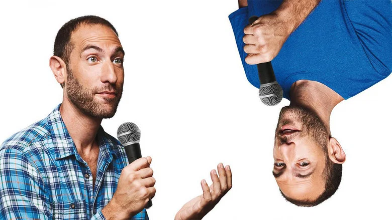 Shaffir mid-joke, arms spread, face twisted in mock outrage