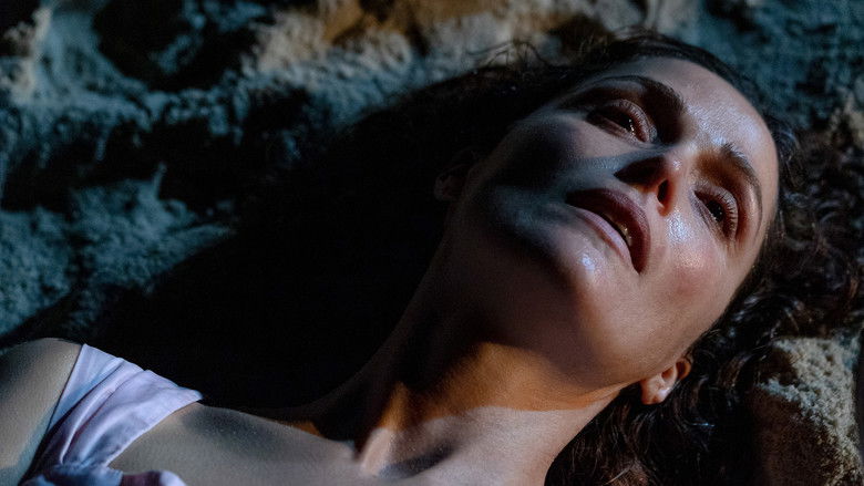 Linda looking overwhelmed in her flooded apartment