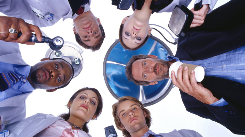 The diagnostic team gathered around the whiteboard