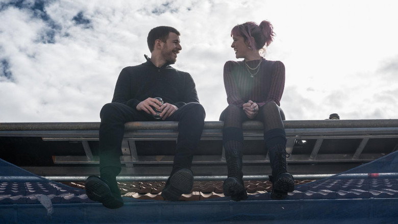 A close-up of two hands intertwined, fingers tense, as if bracing for something unseen
