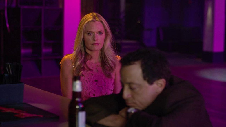 A dimly lit Echo Park apartment, where Jake Spivak broods over his laptop, the glow of the screen casting shadows on his face.