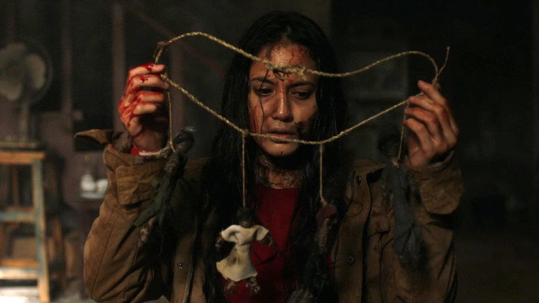 A dimly lit room in the villa, where a grotesque voodoo doll sits on a shelf, its stitched mouth curled into a silent scream.