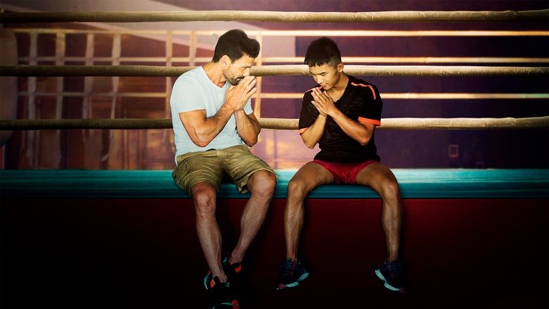 Grillo training with a lethwei fighter in Myanmar, the camera capturing the intensity of their sparring session