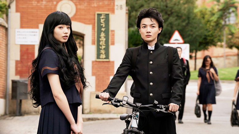 A tense stand-off between characters in a classroom setting