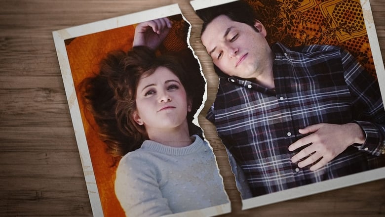 A couple sits on opposite ends of a couch, staring at their phones, the glow of the screen casting sharp shadows on their faces