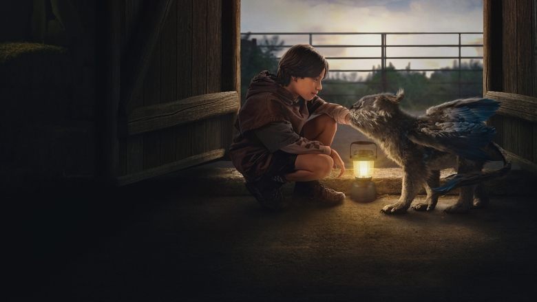 A young boy crouches in a dimly lit shed, reaching out to a small, furry creature with glowing eyes and bat-like ears, its wings folded tightly against its body.