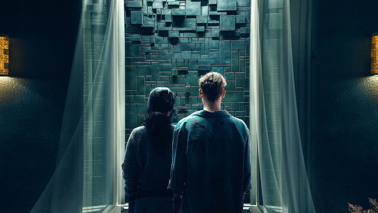 The moment Olivia opens the door to find the hallway replaced by a seamless black wall, her face caught between disbelief and dawning horror.