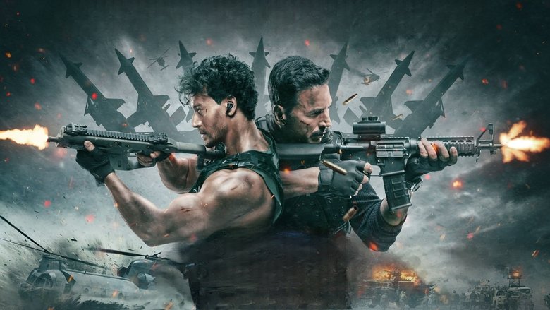 A high-speed chase through a neon-lit cityscape, the camera tilting wildly as Akshay Kumar and Tiger Shroff leap between rooftops