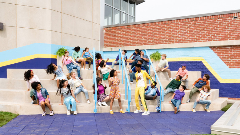 A group of middle-schoolers in a school hallway, their faces a mix of excitement and anxiety, as if caught between a dance number and a panic attack.
