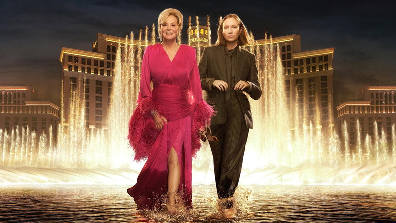 Deborah Vance and Ava Daniels sitting side by side in a dimly lit casino, Deborah in a sequined jacket, Ava in a hoodie, both looking exhausted but oddly at peace.